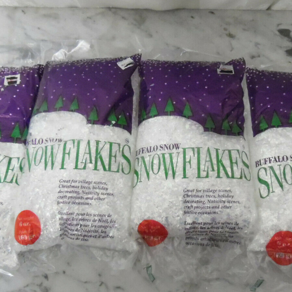 4 bags  total 24oz of Artificial Snow Flakes - 6oz